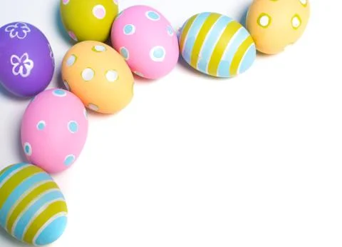 Painted Easter eggs with copy space on background Stock Photos