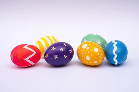 Painted Easter Eggs in Different Colors and Patterns Isolated on White Foto stock
