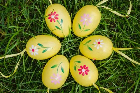 Painted easter eggs on green grass Stock Photos
