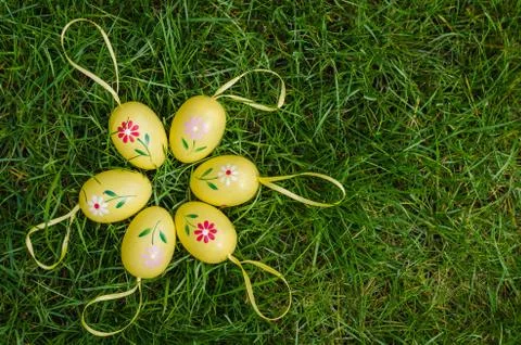 Painted easter eggs on green grass Stock Photos