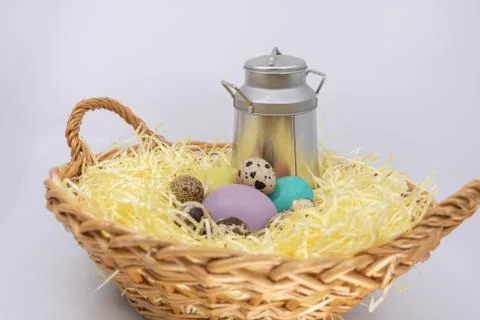 Painted Easter eggs hidden on the farm in fresh produce Stock Photos