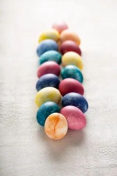 Painted Easter eggs on light concrete Fotos de archivo