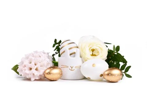 Painted Easter eggs with metallic golden and white stripes and dots and cute Stock Photos