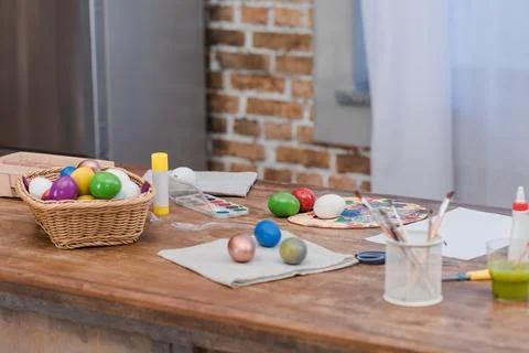 Painted easter eggs paint brushes Stock Photos