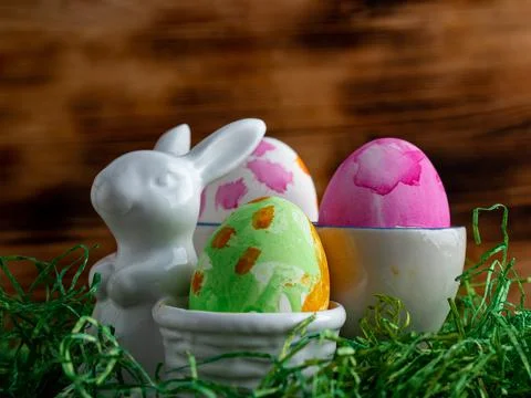 Painted Easter eggs. Painted Easter eggs on a wooden background. Stock Photos