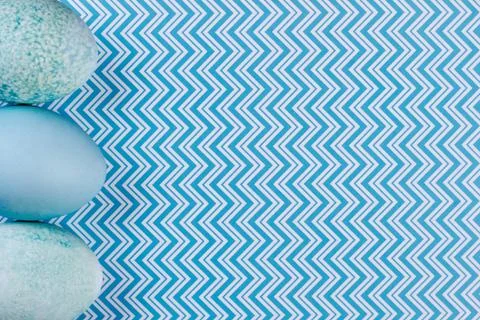 Painted Easter eggs on patterned background. 库存照片