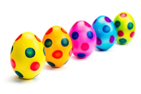 Painted easter eggs in row on white background Stock Photos