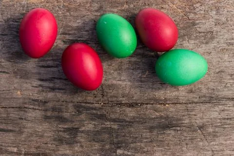 Painted Easter eggs on rustic wooden background Stock Photos