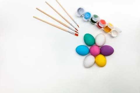 Painted Easter eggs in the shape of a flower on a white background Stock Photos