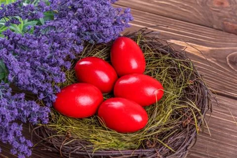Painted Easter eggs on a wooden background. Stock Photos