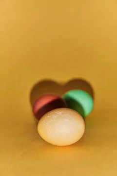 Painted Easter eggs on a yellow background. With space to copy Stock-Fotos