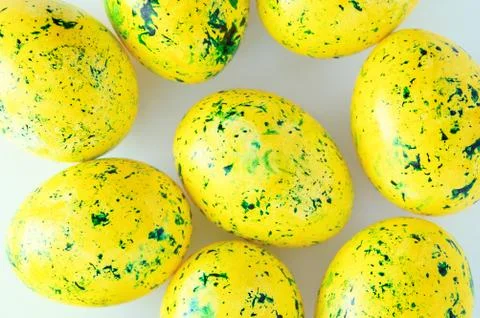 Painted Easter yellow eggs. Close-up. View from above. Stock Photos