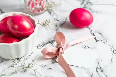 Painted eggs and a note on Easter holiday Stock Photos
