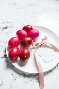 Painted eggs and a note on Easter holiday Stock Photos