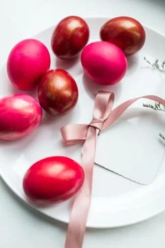 Painted eggs and a note on Easter holiday Stock Photos