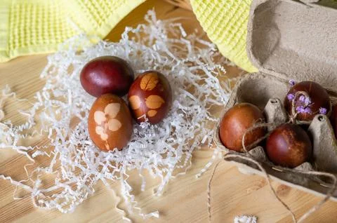 Painted eggs cooked for Easter are in an eco-friendly tray on the table Stock Photos