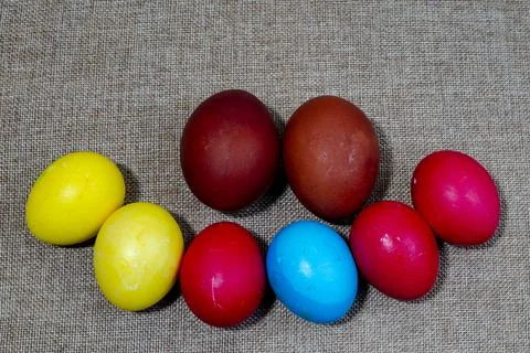 Painted eggs for easter lie on canvas Stock Photos