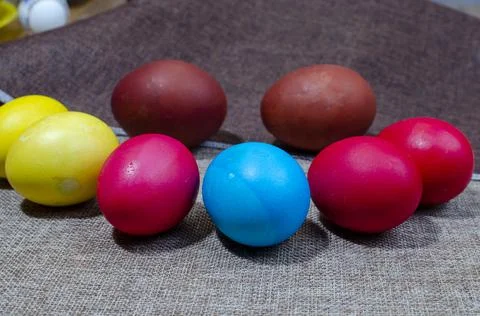 Painted eggs for easter lie on canvas Stock Photos