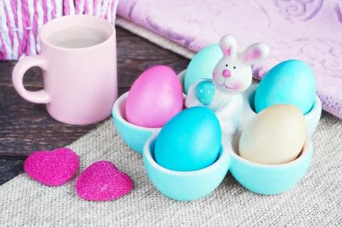 Painted eggs, in a stand with an Easter hare. Фото