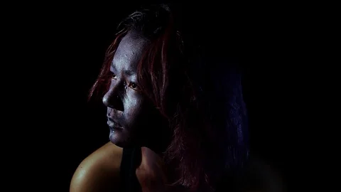 The painted face looks into the light Stock Footage 123270824
