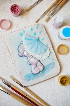 Painted gingerbread on a white background. Gingerbread in flat lay compositio Stock Photos