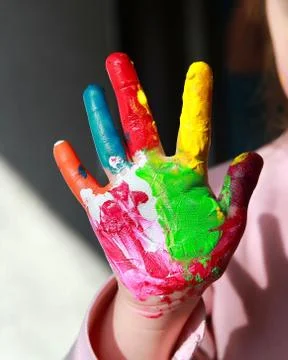 Painted hand of the child Stock Photos