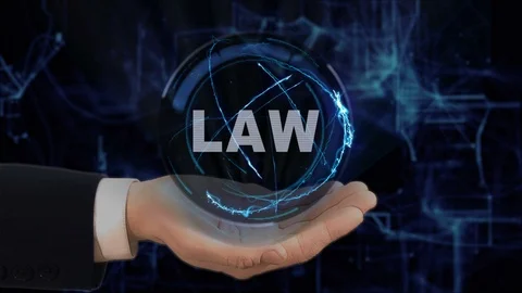 Painted hand shows concept hologram Law on his hand Stock Footage 88556751