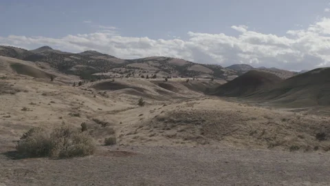 Painted Hills, Clouds drifting above still landscape, static shot Video stock 332237850