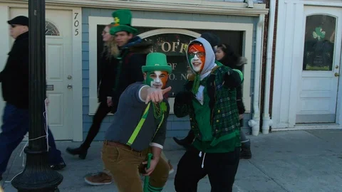 Painted Irish Flag faces Saint Patrick's Day South Boston Video stock 87351537
