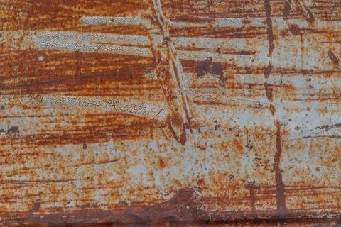 Painted iron surface with a large rusty and metal corrosion, old background Stock Photos