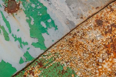 Painted iron surface with a large rusty and metal corrosion, chipped paint Stock Photos