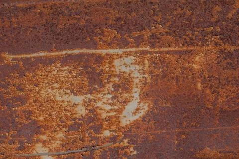 Painted iron surface with a large rusty and metal corrosion, old background Stock Photos