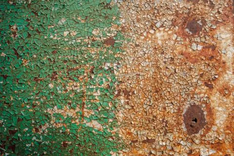 Painted iron surface with a large rusty and metal corrosion, chipped paint Stock Photos