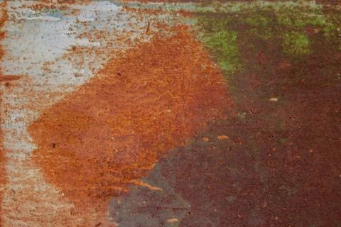 Painted iron surface with a large rusty and metal corrosion, old background Stock Photos
