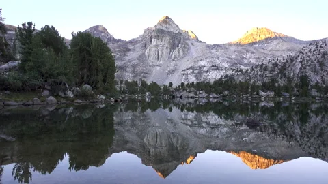 Painted Lady Mountain with Water Reflection at Sunrise Stock Footage 137614448