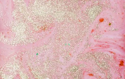 Painted light red water with sequins. High quality and resolution beautiful Stock Photos