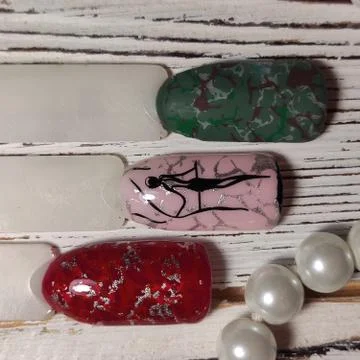 Painted nail tips in different colors. Manicure Stock Photos