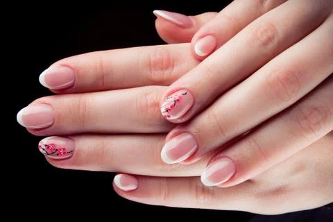 Painted nails and hands isolated on black background Stock Photos