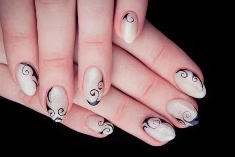 Painted nails and hands isolated on black background Stock Photos