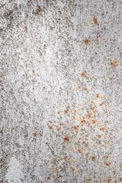 Painted old metal surface with rust appearing. The texture of painted metal. Stock Photos