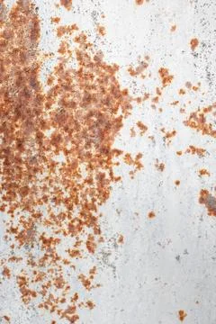 Painted old metal surface with rust appearing. The texture of painted metal. Stock Photos