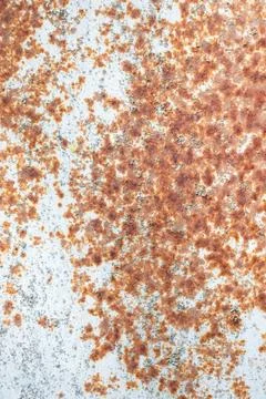 Painted old metal surface with rust appearing. The texture of painted metal. Stock Photos