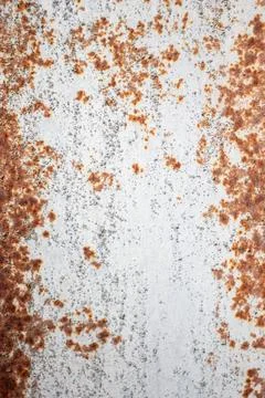 Painted old metal surface with rust appearing. The texture of painted metal. Stock Photos
