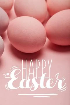 Painted pink eggs pink surface Stock Photos