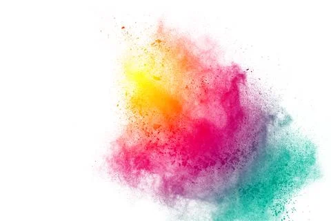 Painted powder explosion on white background. Yellow-Red-Green dust explode.. Stock Photos