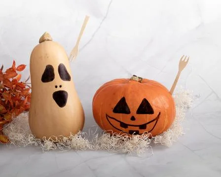 Painted pumpkins with jack o lantern faces for Halloween Stock Photos