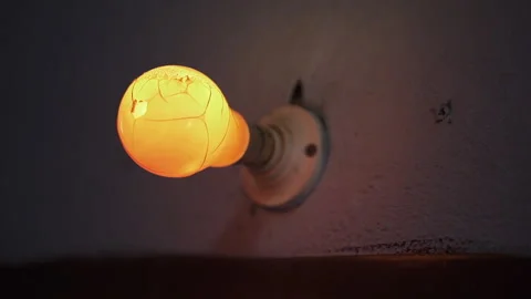 Painted retro light bulb on the wall of a radiostation ON AIR Stock Footage 258243063