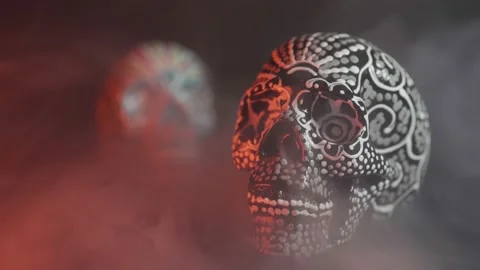 Painted skull for the Day of the Dead in red light with smoke Stock Footage 141591969