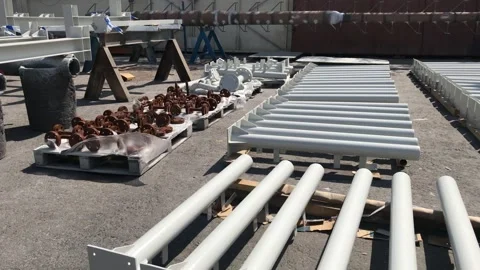 Painted structural steel items kept in direct sun for drying Stock Footage 170368334