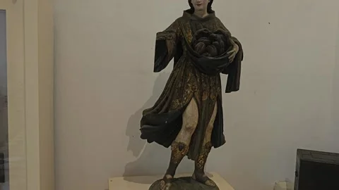 Painted Wooden Saint Statue on White Pedestal, Colombia 8K Stock Footage 331506953